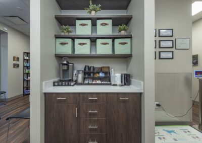 A small office featuring a desk and cabinets
